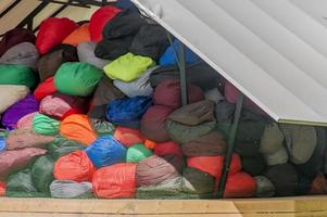 plenty of soft and colorfull beanbag chairs under the roof photo