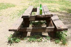 Bench in a city park on the Mediterranean coast photo