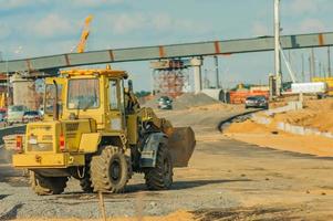 excavator at the construction site photo