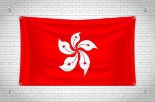 bandera de hong kong colgada en la pared de ladrillo. dibujo 3d bandera pegada a la pared. dibujar cuidadosamente en grupos en capas separadas para facilitar la edición. vector