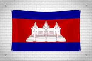 Cambodia flag hanging on brick wall. 3D drawing. Flag attached to the wall. Neatly drawing in groups on separate layers for easy editing. vector