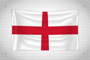 England flag hanging on brick wall. 3D drawing. Flag attached to the wall. Neatly drawing in groups on separate layers for easy editing. vector