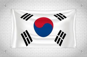 South Korea flag hanging on brick wall. 3D drawing. Flag attached to the wall. Neatly drawing in groups on separate layers for easy editing. vector