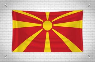 Macedonia flag hanging on brick wall. 3D drawing. Flag attached to the wall. Neatly drawing in groups on separate layers for easy editing. vector