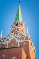 Trinity tower of Moscow Kremlin against blue sky photo