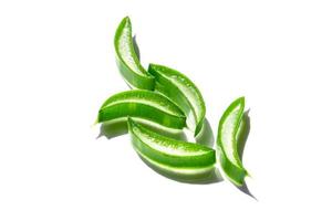 Sliced leaf of aloe vera on white background. Natural organic ingredient for cosmetics. Aloe gel. photo