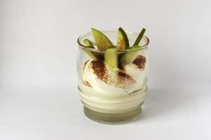 Fresh apple dessert with cinnamon and cream photo