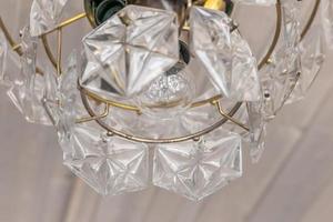 Chrystal chandelier closeup. Selective focus photo