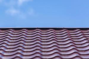 Tile roofs, patterns of blue sky photo