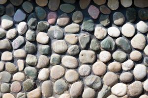 background texture of the stone wall. abstract backdrop for design photo
