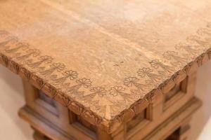 carved wooden chair closeup photo