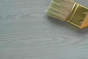 painted wooden desk and brush photo