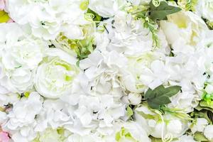 artificial blooming peonies of white color background