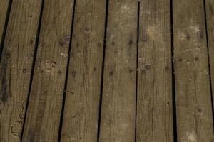 wooden desk floor outdoors in sunset light photo