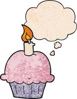 cartoon birthday cupcake and thought bubble in grunge texture pattern style