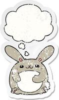 cartoon rabbit and thought bubble as a distressed worn sticker vector