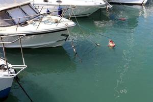 Berth on the seashore for mooring boats and yachts. photo