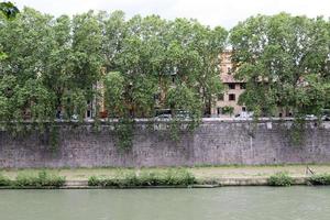 May 9, 2022 Tiber river Italy. Full-flowing river Tiber in the center of Rome. photo