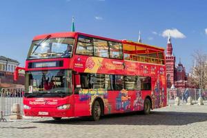 MOSCOW, RUSSIA - APRIL 11, 2018 City Sightseeing red bus with Red Square view photo