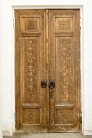 wooden decorated door with carving photo