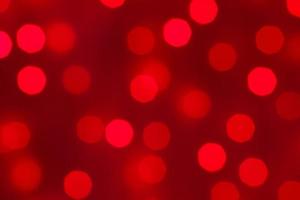 Decorative red LED lights on wires - Defocused gradient background photo