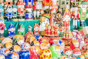 closeup of wooden souvenirs for sale in market place in Moscow photo