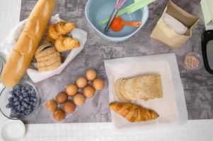 Baking or cooking ingredients composition on the kitchen table  background, coffee shop business concept photo