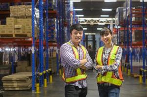 Portrait of factory workers in modern warehouse storage of retail shop photo