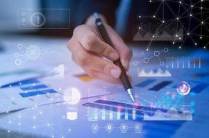 Background of documents with analytics data lying on table photo