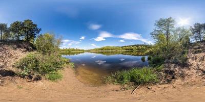 seamless spherical hdri panorama 360 degrees angle view on grass coast of huge river or lake in sunny summer day and windy weather in equirectangular projection with zenith and nadir, VR AR content photo