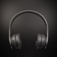 Wireless Headphones, Black leather on black background 3d render photo