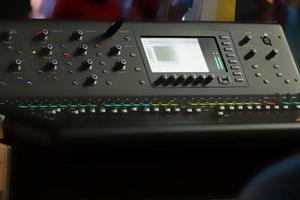 Set of digital studio sound and music mixer and recording device in blurry. photo