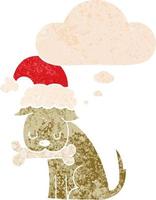 cute christmas dog and thought bubble in retro textured style vector