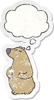 cartoon bear and thought bubble as a distressed worn sticker vector