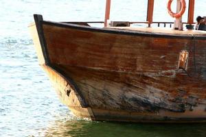 Berth for mooring boats and yachts on the seashore. photo