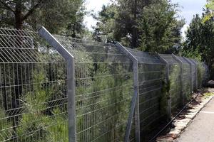 Fence in a city park in Israel. photo