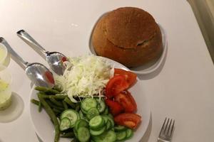 On the table in the restaurant lunch on order. photo