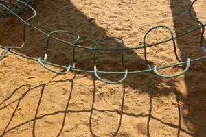Toys and sports equipment on a playground in Israel. photo