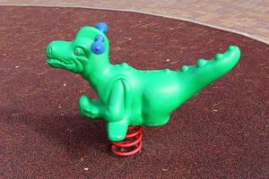 Toys and sports equipment on a playground in Israel. photo