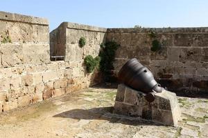 January 21, 2019 Israel. old cannon on the fortress wall in Akko city. photo