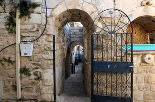 A door is an opening in a wall to enter and exit a building. photo