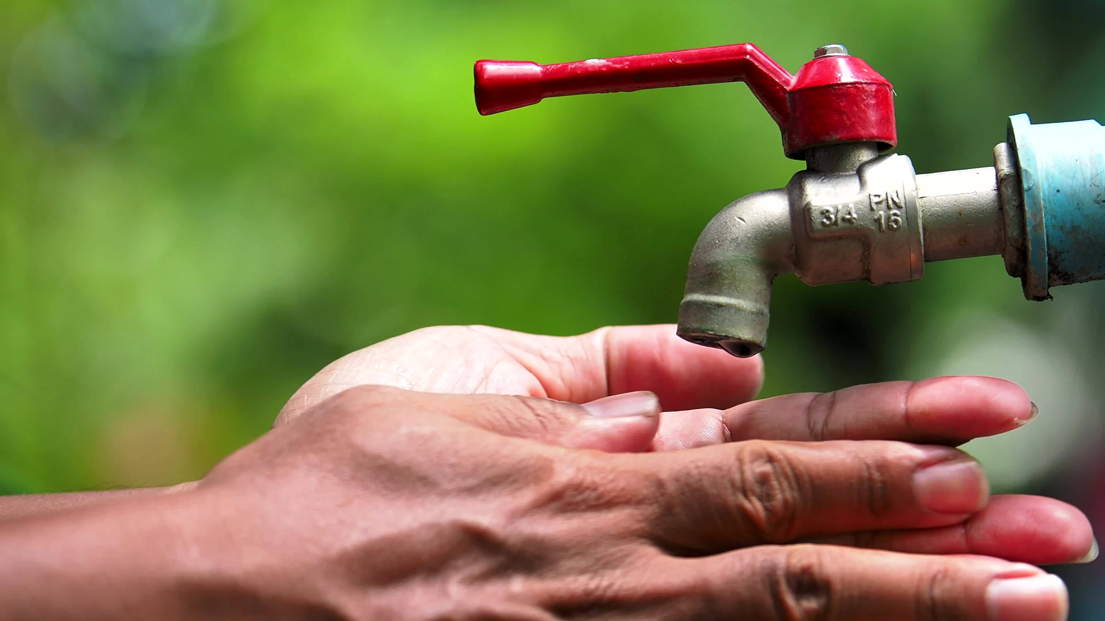 The concept of water crisis and despair from lack of clean water caused by drought. The faucet