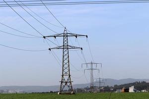 Electric pole and wires carrying high voltage current photo