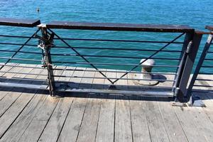 Fencing in a city park on the Mediterranean coast photo