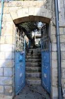 A door is an opening in a wall to enter and exit a building. photo