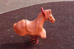 Toys and sports equipment on a playground in Israel. photo