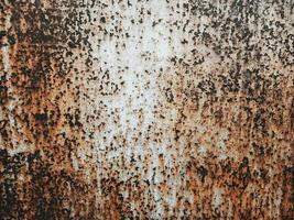 Old metal rust corrosion shabby texture background, dark worn iron brown color, vintage grunge backdrop. photo