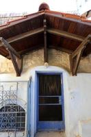 A door is an opening in a wall to enter and exit a building. photo
