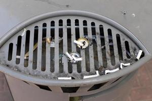 Ashtray - a place for tobacco ash and cigarette butts photo