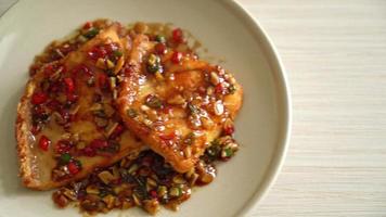 Fried Snapper Belly with Spicy Garlic Soy Sauce in Asian Style video